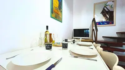 TV o dispositivi per l'intrattenimento presso Casa Ambra - Villetta con vista, giardino e BBQ