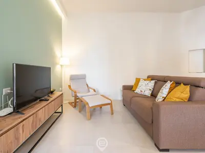 TV o dispositivi per l'intrattenimento presso Sleek City Oasis