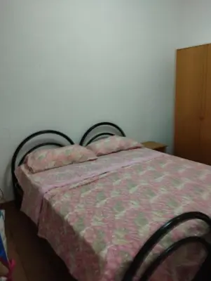 Letto o letti in una camera di casa vacanze Cettina home 2 mt 50 dal mare