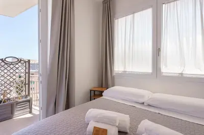 Letto o letti in una camera di Lumiere Rooms - Eja Sardinia