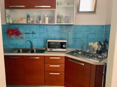 Cucina o angolo cottura di Villa Cala Sinzias