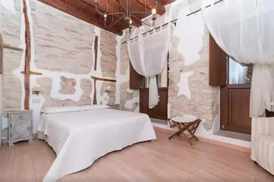 Letto o letti in una camera di Archè