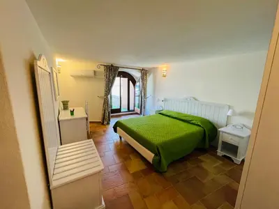 Letto o letti in una camera di Villa Malva Apartment