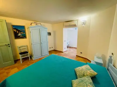 Letto o letti in una camera di Villa Malva Apartment