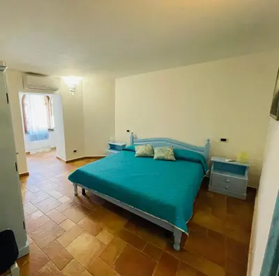 Letto o letti in una camera di Villa Malva Apartment