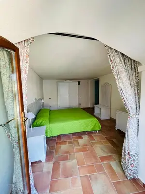Letto o letti in una camera di Villa Malva Apartment