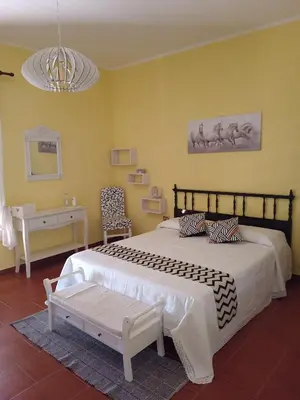 Letto o letti in una camera di Domo Is Domus