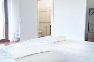 Letto o letti in una camera di Domo Is Domus