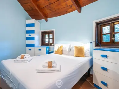 Letto o letti in una camera di Villa Giada