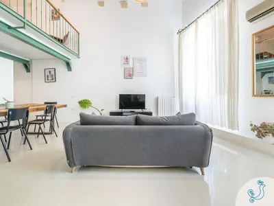 Area soggiorno di San Diego - Bright and Colourful loft with Cathedral view