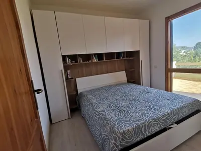 Letto o letti in una camera di Santa Luria Casa dolce Casa