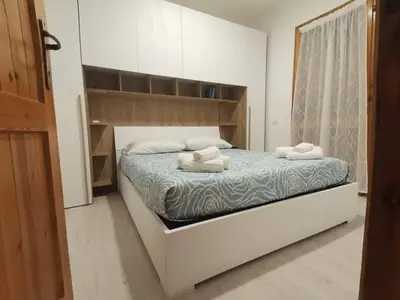 Letto o letti in una camera di Santa Luria Casa dolce Casa