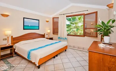 Letto o letti in una camera di Residence Baia delle Palme Unit 1-Studio