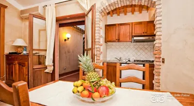Cucina o angolo cottura di Classical Residence Baia delle Palme Premium num1212
