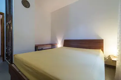 Letto o letti in una camera di Beach House, on the sand