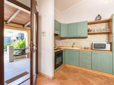 Cucina o angolo cottura di Holiday Home Il Nido di Mennenne by Interhome