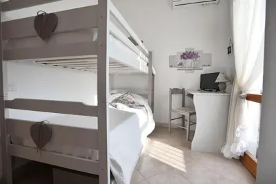 Letto o letti in una camera di Romantic Home