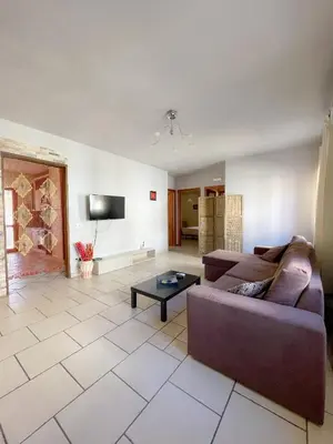 TV o dispositivi per l'intrattenimento presso Biriala Apartment 1