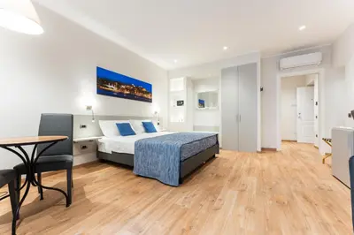 Letto o letti in una camera di The Inga Rooms Marina