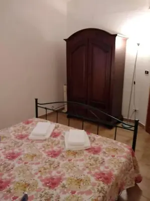 Letto o letti in una camera di Appartamento Ginepro