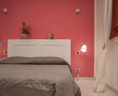 Letto o letti in una camera di Casa Nettuno