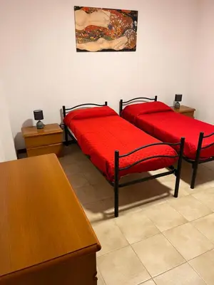 Letto o letti in una camera di Il Sole