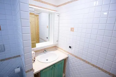 Bagno di OASI BEACH Apartment