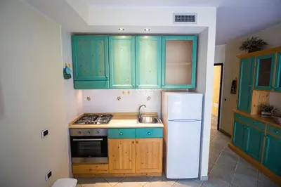Cucina o angolo cottura di OASI BEACH Apartment