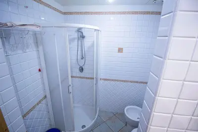 Bagno di OASI BEACH Apartment