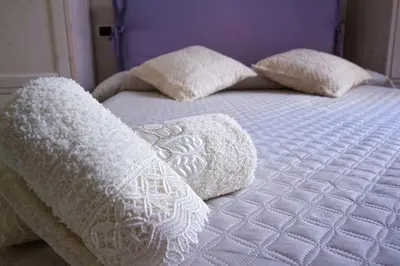 Letto o letti in una camera di OASI BEACH Apartment