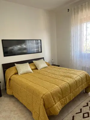 Letto o letti in una camera di Casa Ubi