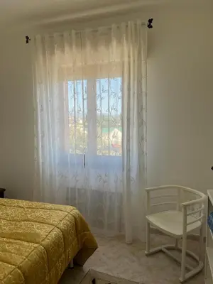 Letto o letti in una camera di Casa Ubi