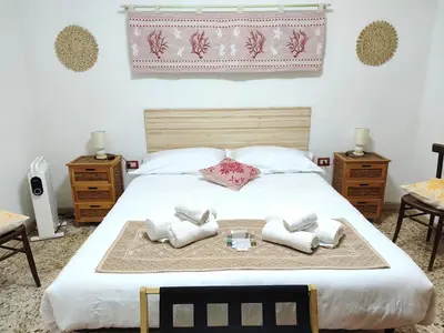 Letto o letti in una camera di Da Tziu Efisiu Mare e Relax nel Sinis