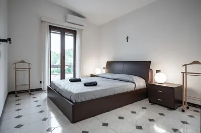 Letto o letti in una camera di GuestHost - Quartu Sant'Elena Bright Flat with Balcony!