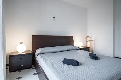 Letto o letti in una camera di GuestHost - Quartu Sant'Elena Bright Flat with Balcony!