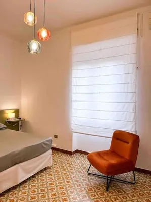 Letto o letti in una camera di Casa vacanze “Tuvixeddu”