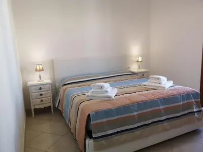 Letto o letti in una camera di Casa vacanze Elsa
