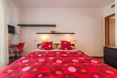Letto o letti in una camera di La terrazza di Sant'Avendrace