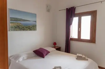 Letto o letti in una camera di Case Fiorite