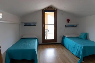 Letto o letti in una camera di Case Fiorite