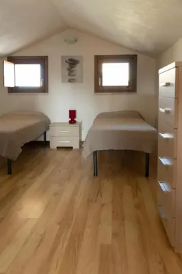 Letto o letti in una camera di Case Fiorite