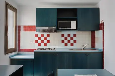 Cucina o angolo cottura di Residence Verde Mare Official Site