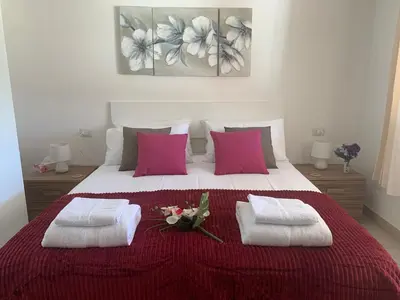 Letto o letti in una camera di B&B Hideaway Haven Villa