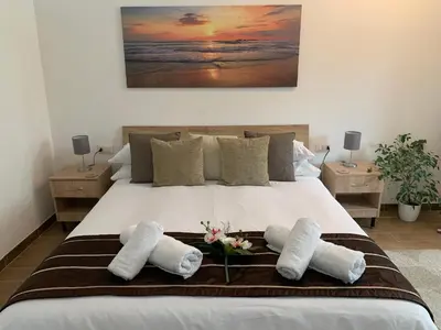 Letto o letti in una camera di B&B Hideaway Haven Villa