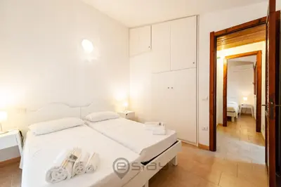 Letto o letti in una camera di Casa Nicole