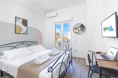 Letto o letti in una camera di Quarzo Modern Rooms