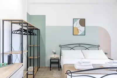 Letto o letti in una camera di Quarzo Modern Rooms