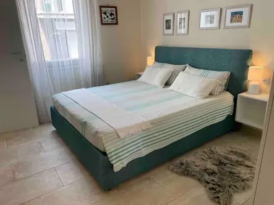 Letto o letti in una camera di La magia del mare in Sardegna (I.U.N. Q5901)