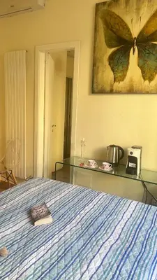 Letto o letti in una camera di Lily CA