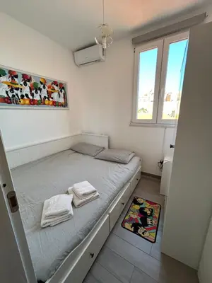 Letto o letti in una camera di Inner City History House